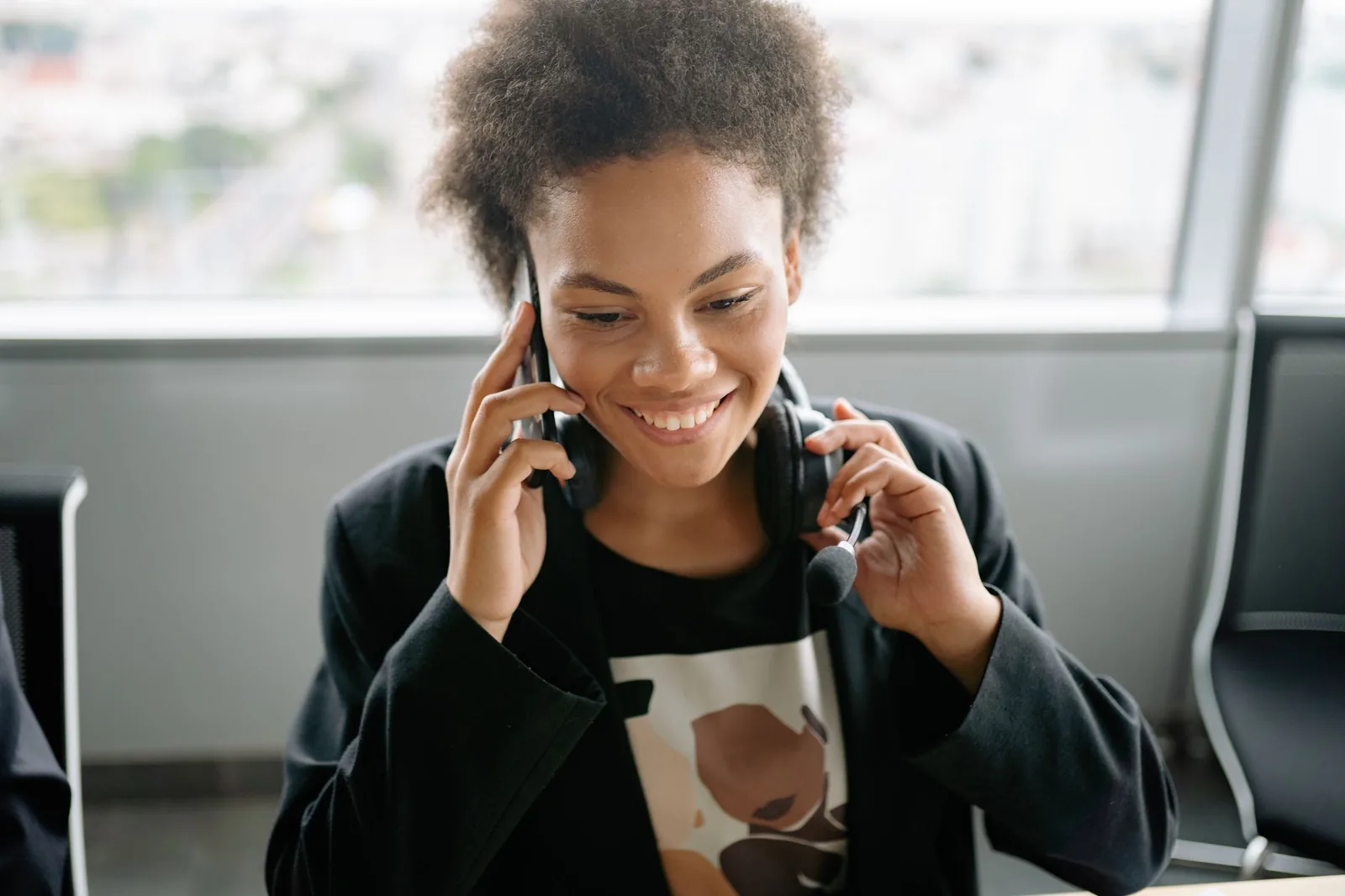 Solo operator using voice assistant on smartphone to manage calendar and email hands-free